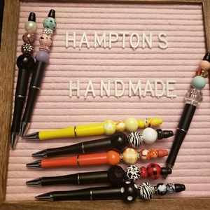 Beaded ink pens